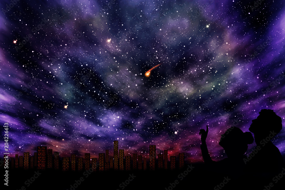 Romantic couple looking at a colored starry sky in the background of a night city