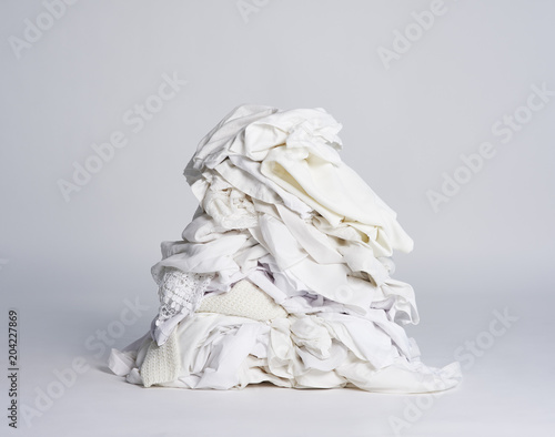 Foto Laundry heap on the grey background.