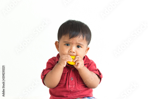 Canvas Print Cute little baby bite toy