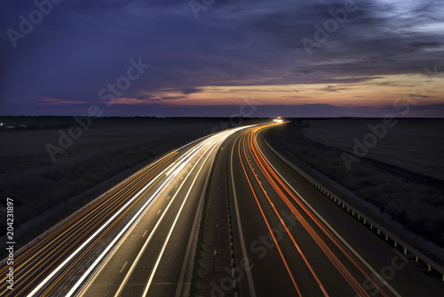 Car light trails on highway