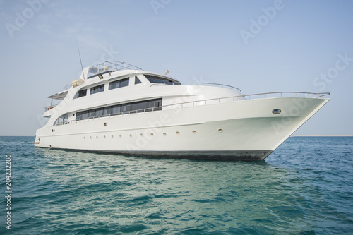 Luxury private motor yacht at sea © Paul Vinten