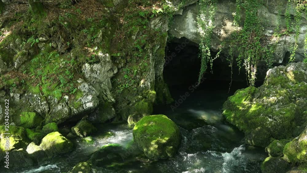 Close-up View of Water Flowing from the Mount Cave. 4K Ultra HD Close-up View of Water Flowing from the Mount Cave. 4K Ultra HD