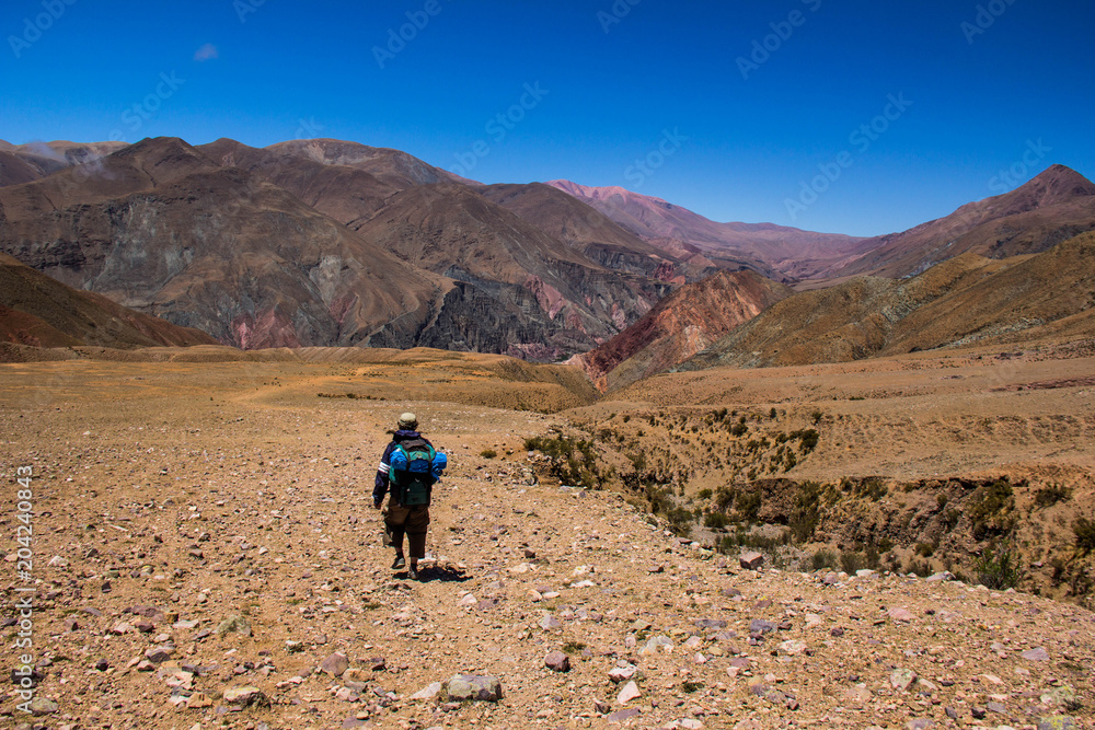 View of Iruya village and multicolored mountains in the surroundings at sunset, Salta province, Argentina, iruya - San Isidro - San Juan treeking View of Iruya village and multicolored mountains in the surroundings at sunset, Salta province, Argentina, iruya - San Isidro - San Juan treeking