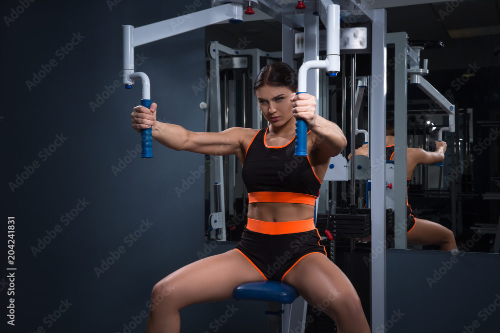Sport. Beautiful woman in gym. Halthy concept Sport. Beautiful woman in gym. Halthy concept