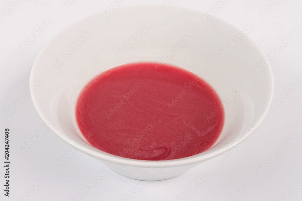 Beet soup with wine on a white Beet soup with wine on a white