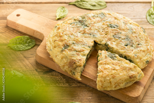 Omelette  of spinach and cheese and leek (3d effect)