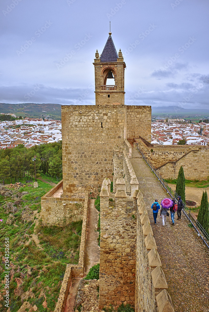 Tourists in Antequera visiting the castle of the town