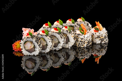 sushi rolls isolated on the black background