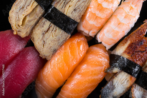 sushi on the black background