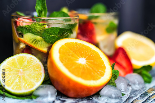 Homemade lemonade with fruit and mint