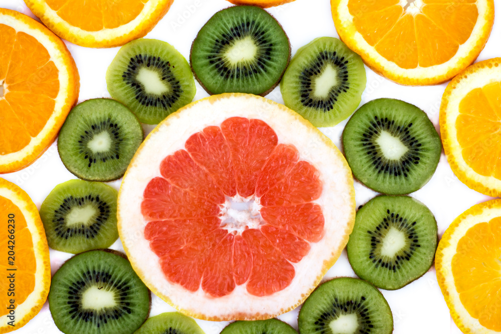 sliced KIWI fruit with a slice of grapefruit and oranges healthy eating sliced KIWI fruit with a slice of grapefruit and oranges healthy eating