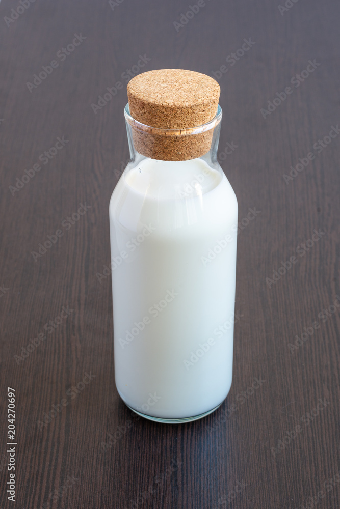 A bottle of fresh milk for breakfast. A bottle of fresh milk for breakfast.