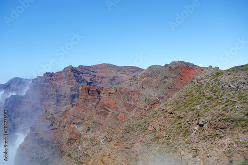 Hiking trail GR131 Rute de los Volcanes leading on the edge of Caldera de Taburiente which is the largest erosion crater in the world, La Palma, Canary Islands, Spain photo