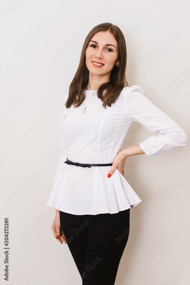 Portrait of young happy smiling businesswoman, isolated on white background Portrait of young happy smiling businesswoman, isolated on white background