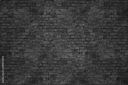 Vintage Black wash brick wall texture for design. Panoramic background for your text or image