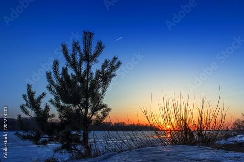 Spring sunset on the Volga River. photo