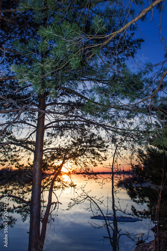 Spring sunset on the Volga River. © sergofan2015