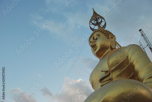 Big Buddha golden statue on the top of mountain by Tiger Cave  Krabi  Thailand