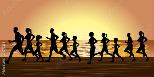 People running and jogging in beach silhouette