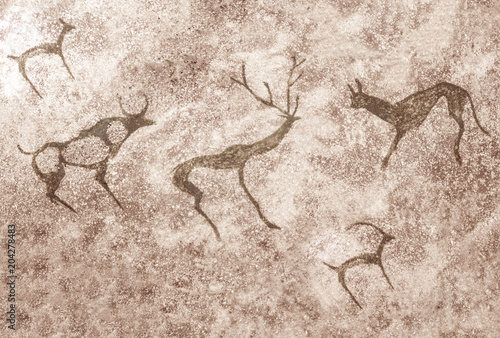 images of ancient animals on the wall of the cave, ancient civilization, ancient art.