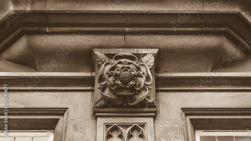 Tudor Rose in Sepia, Architecture Details of old building in Somerset England, sepia tone horizontal photography