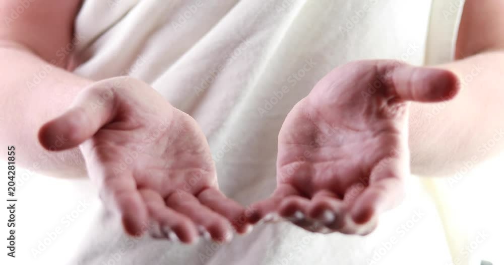 Opening the hands in the light. Hope or care. Opening the hands in the light. Hope or care.