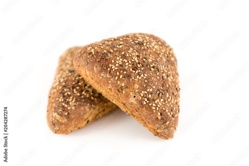 bread with cereals and nuts on white background bread with cereals and nuts on white background