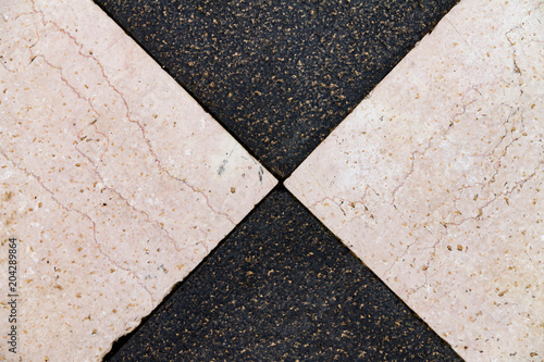 Texture of black and white stone, tiles laid out in mosaic photo