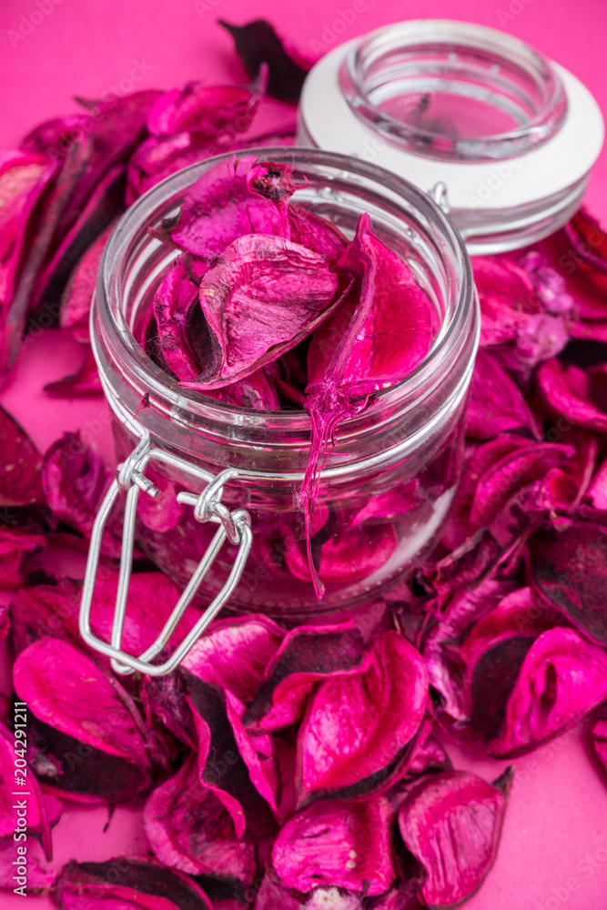 dried red petals in a glass jar dried red petals in a glass jar