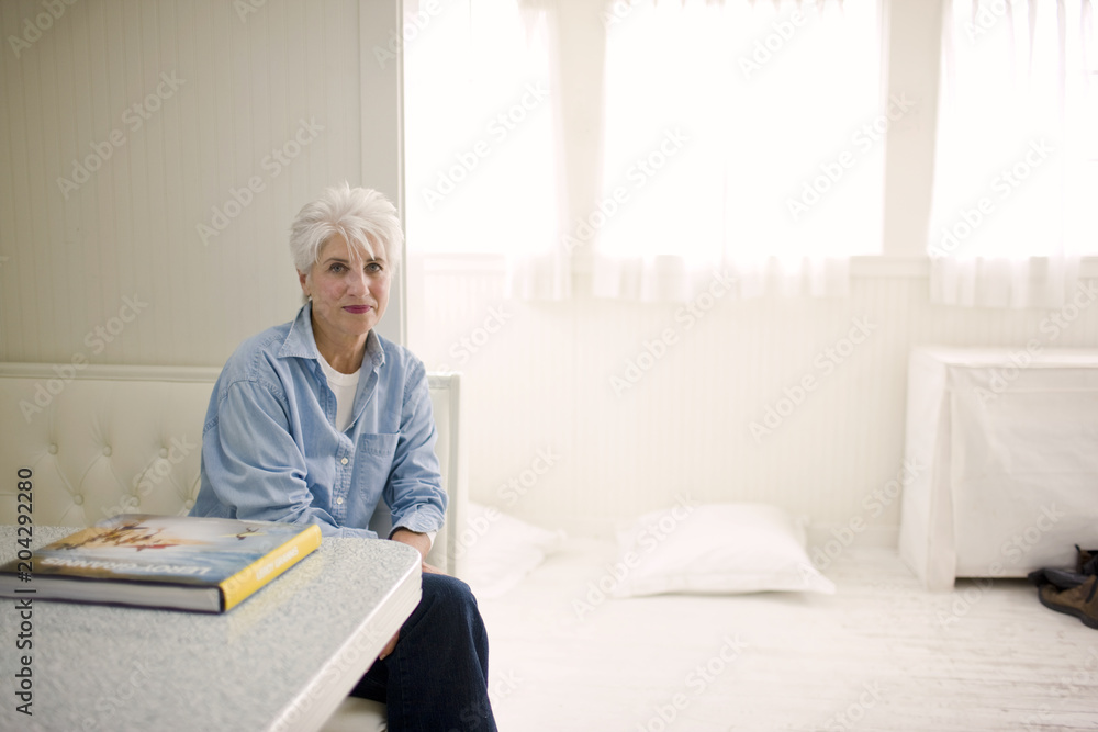 Portrait of a senior woman in her home. Portrait of a senior woman in her home.