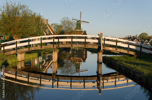 Arch bridge and windmill in Zaanse Schans, The Netherlands