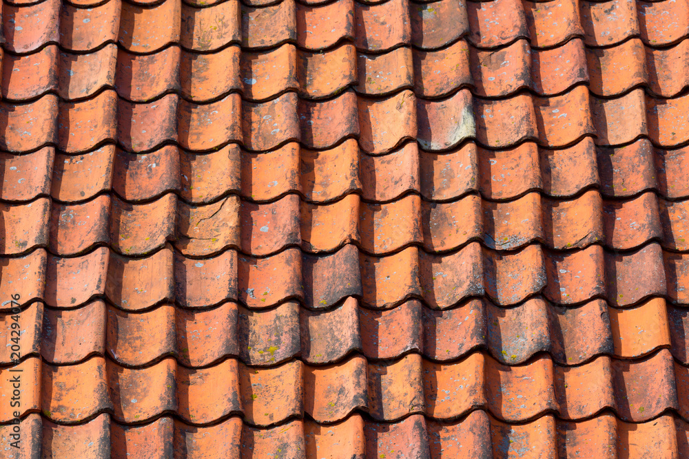 Dutch style red tiled roof. Background or texture. Dutch style red tiled roof. Background or texture.