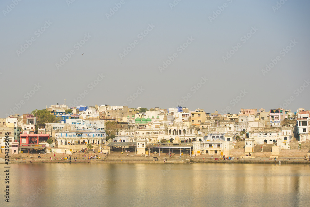 Beautiful Pushkar skyline and sacred lake (Sagar). Rajasthan. Pushkar is holy city for Hinduists and famous for many Hindu temples