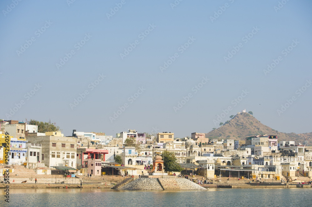 Beautiful Pushkar skyline and sacred lake (Sagar). Rajasthan. Pushkar is holy city for Hinduists and famous for many Hindu temples