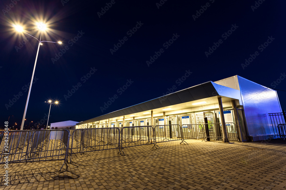 ticket office in front of the stadium at night