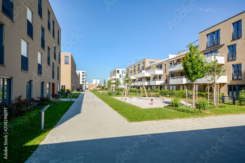 Modern residential buildings with outdoor facilities, Facade of new low-energy houses