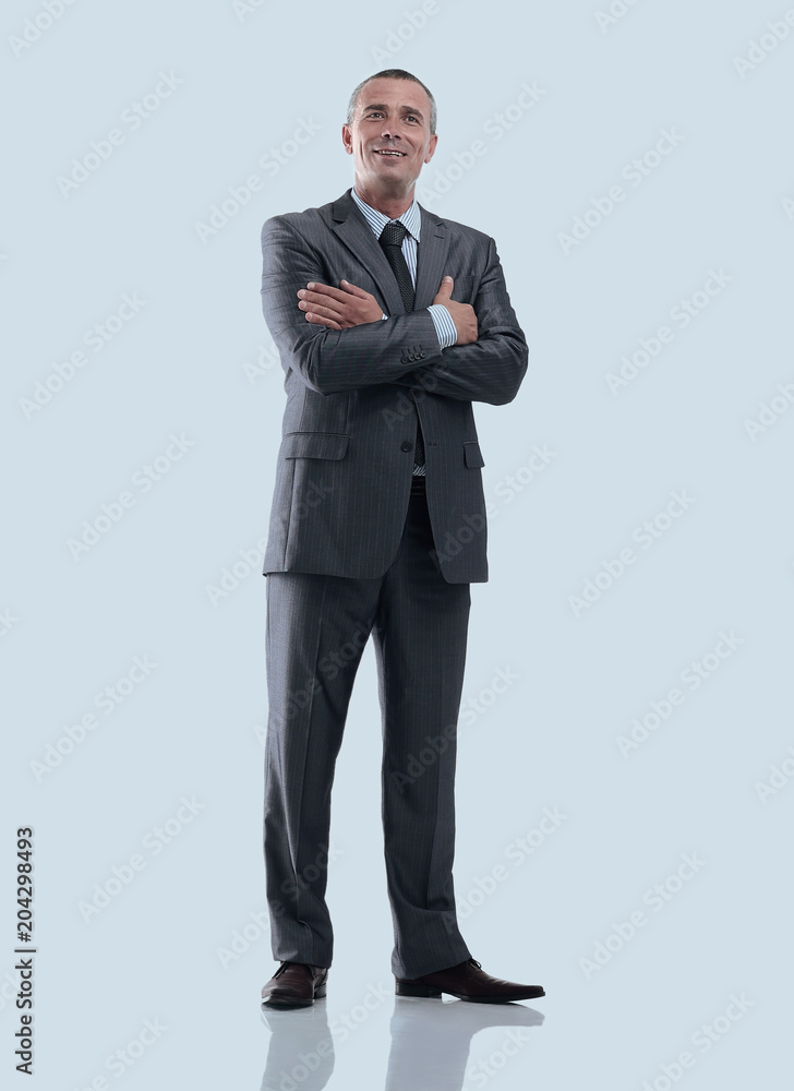 portrait in full growth. successful smiling businessman. portrait in full growth. successful smiling businessman.