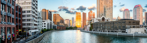 Shanghai, China. Wide view of Suzhou Creek with Jing'an districts on the left and Huangpu on the right. 