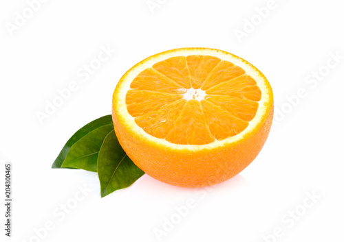 half cut fresh Navel orange with leaf on white background