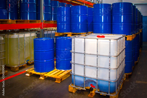 Barrels of chemicals. Chemistry. Metal barrels for chemical products.
