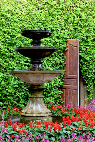 Round water fountain in the garden