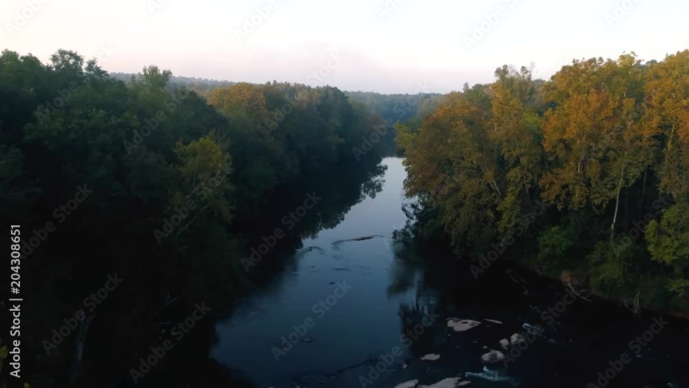 An aerial view of a pristine river on an early fall morning An aerial view of a pristine river on an early fall morning