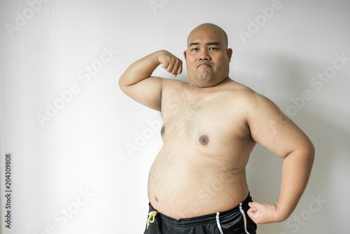 Fat man ,overweight man with big belly on white background in studio.