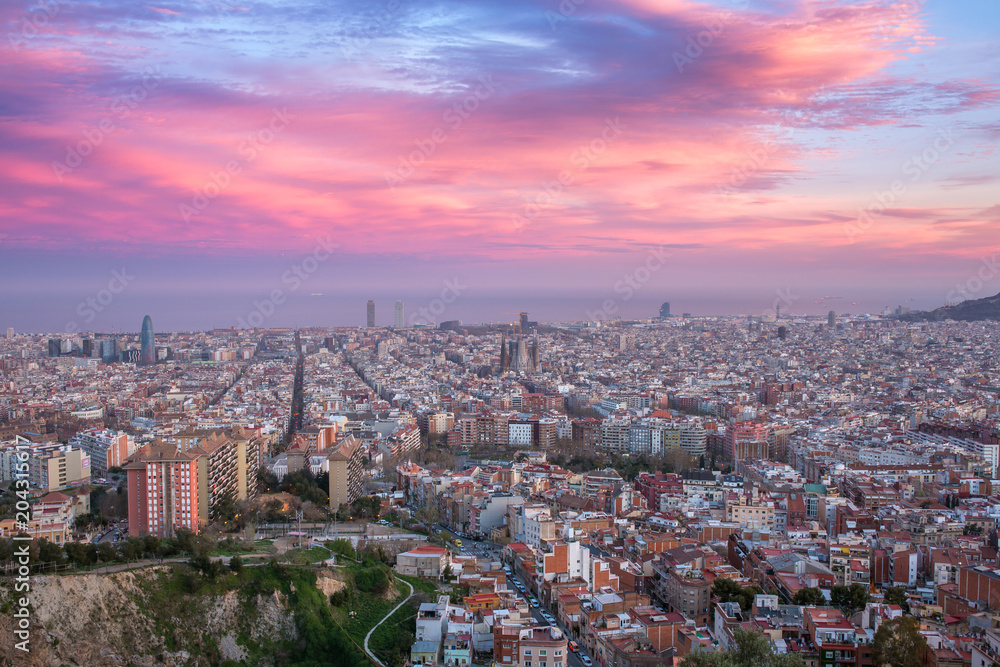 Beautiful panorama view of Barcelona city skyline and Sagrada familia at sunset time, Spain