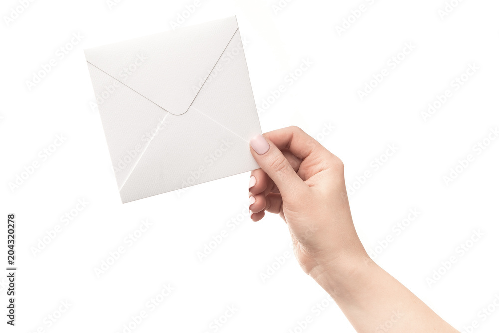 Fototapeta premium A female hands holding mail envelope