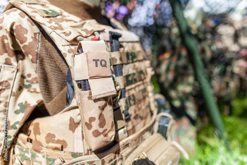 TQ tourniquet bag on a german soldier desert uniform photo