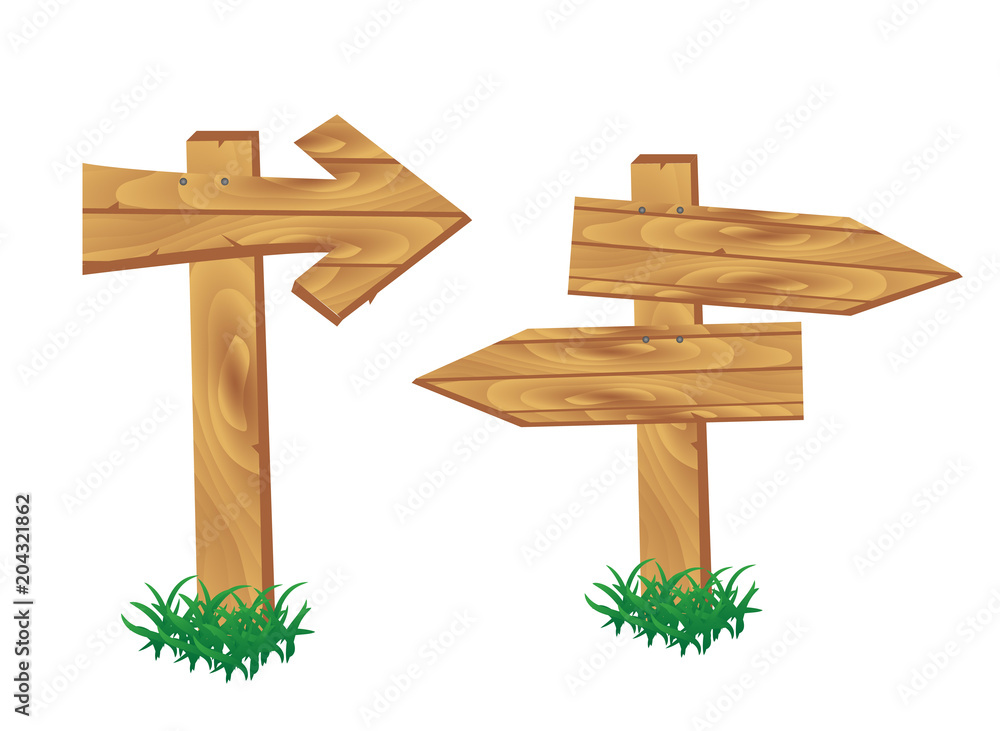 Wooden signpost standing in grass set isolated Wooden signpost standing in grass set isolated