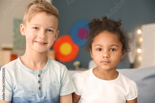 Cute boy and African-Americ...