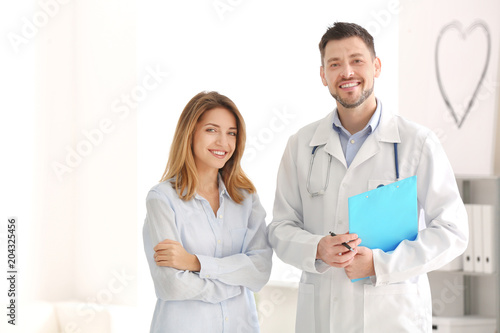 Doctor with female patient ...