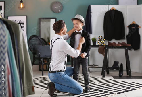 Stylish father and son, ind...